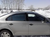 Дефлектори вікон вітровики з хром вставкою (нерж.) для Skoda Rapid 2012+