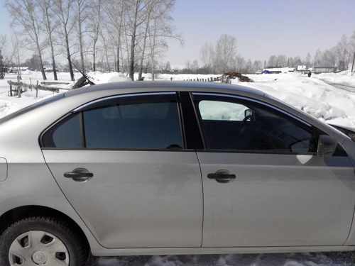 Дефлектори вікон вітровики з хром вставкою (нерж.) для Skoda Rapid 2012+