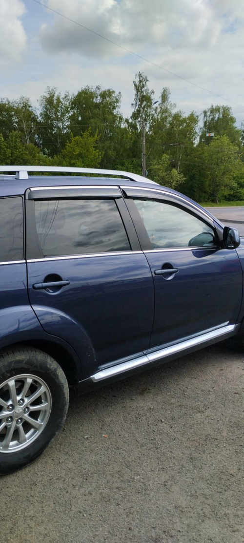 Дефлектори вікон вітровики Peugeot 4007 з хром окантовкою з нержавійки 