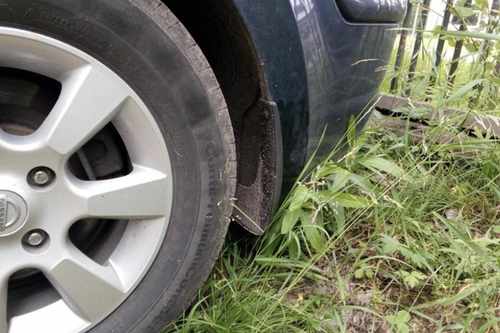 Задні бризковики Nissan Tiida 2006-2013 2шт.