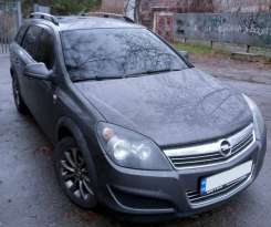 Рейлінги Opel Astra H 2004-2013 / Opel Zafira B, хромовані, Caravan, DDU (2 шт)