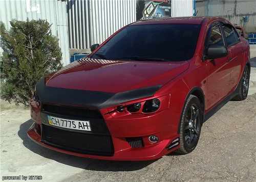 Передні фари HELLAMitsubishi Lancer X