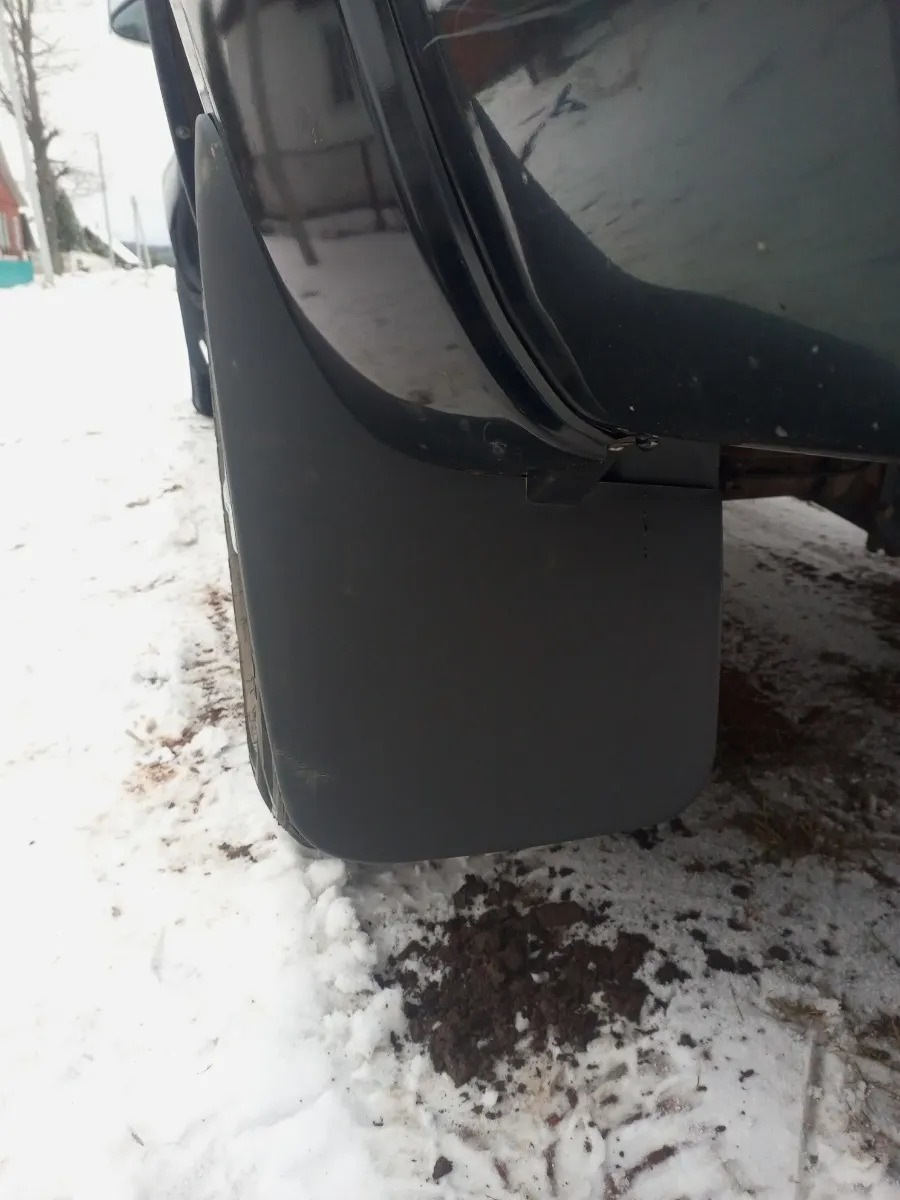 Бризковики Nissan Navara D22, NP300 1998-2014 з пластиковими арками, 4шт.